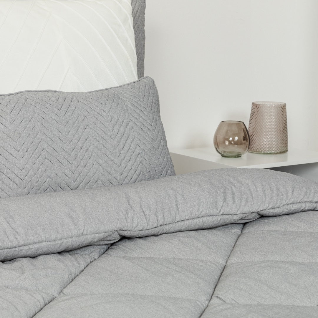 Edredom liso com efeito desgastado