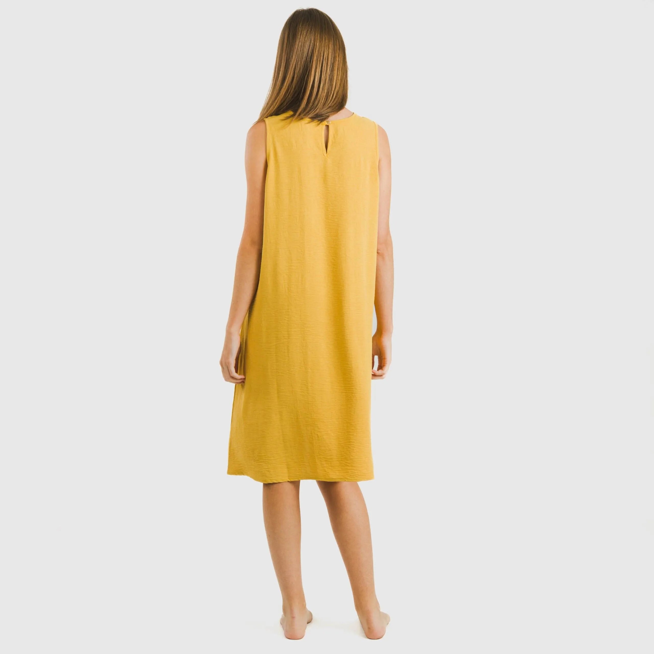 Vestido curto com alças, em musselina de algodão lisa.