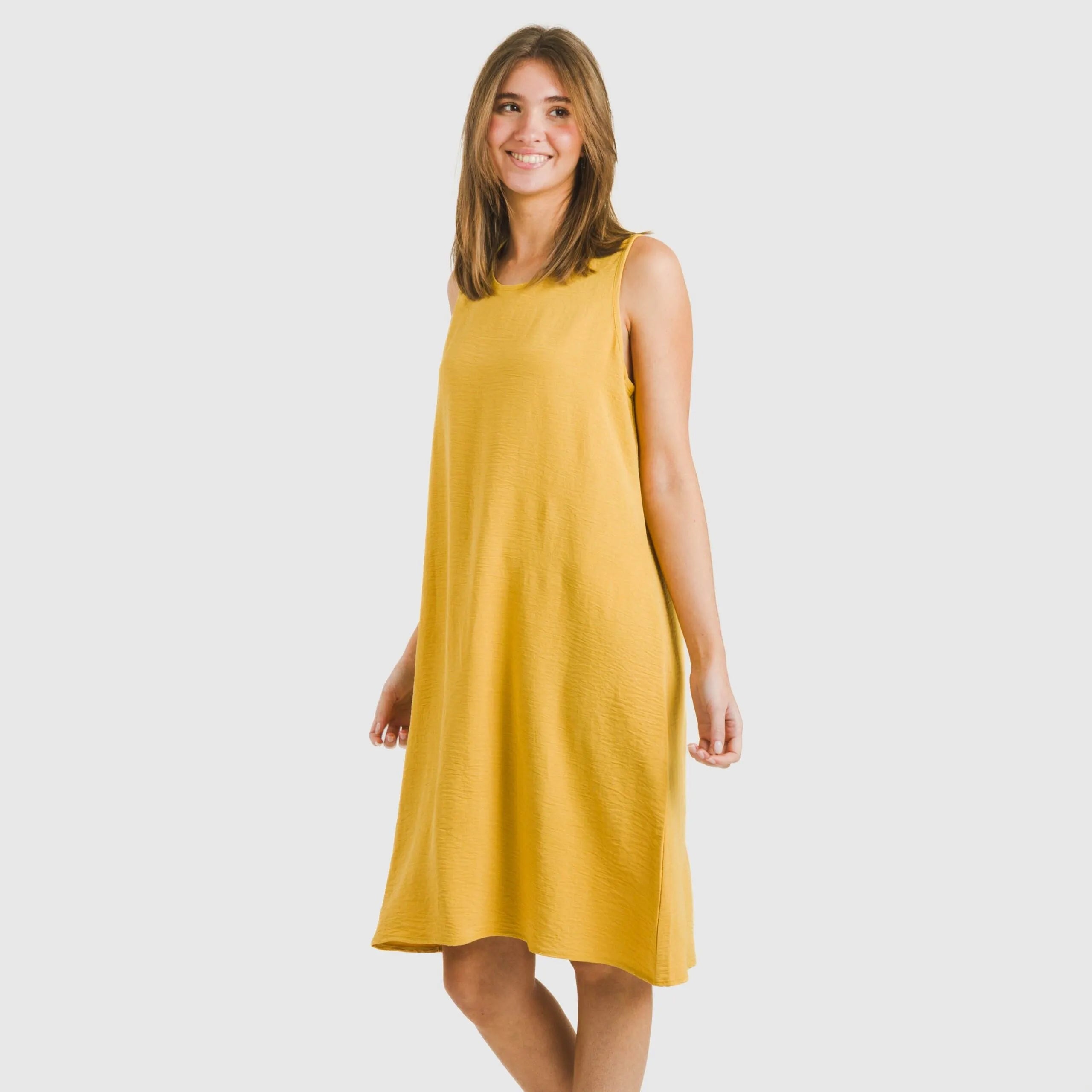 Vestido curto com alças, em musselina de algodão lisa.