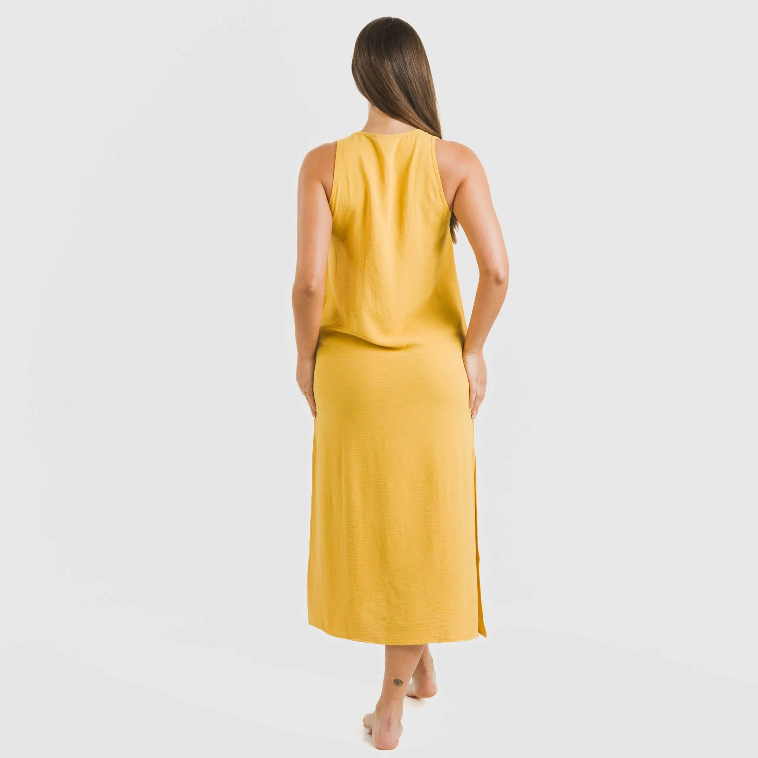 Vestido longo de alças finas em musselina de algodão lisa.