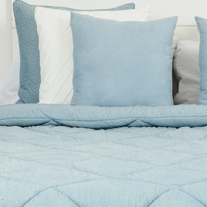 Edredom liso com efeito desgastado