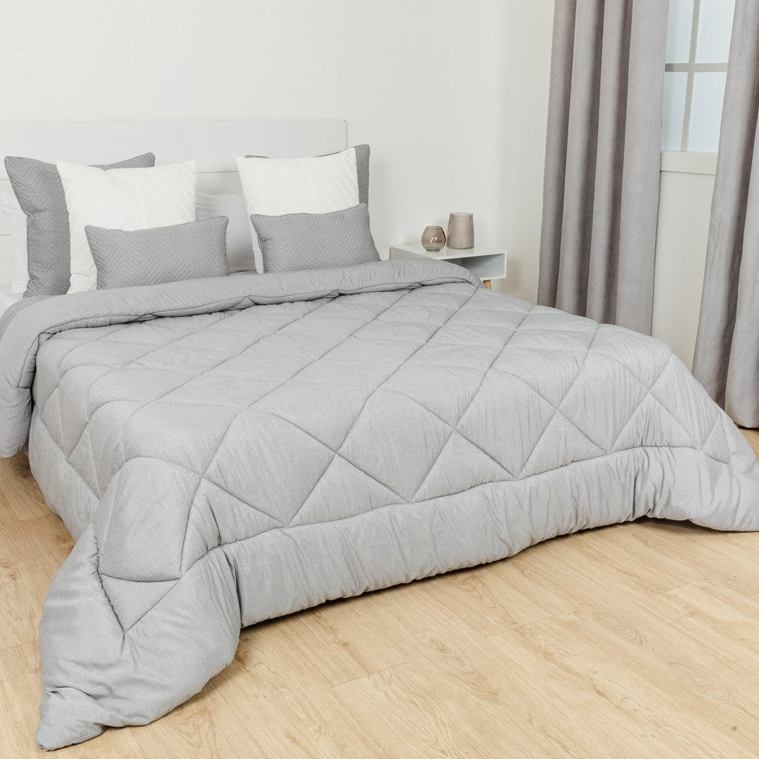 Edredom liso com efeito desgastado