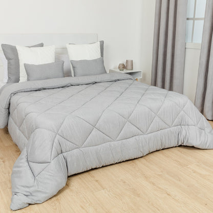 Edredom liso com efeito desgastado