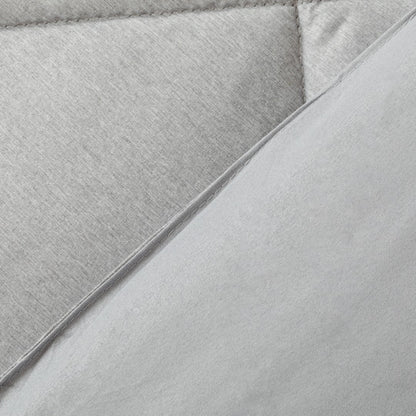 Edredom liso com efeito desgastado