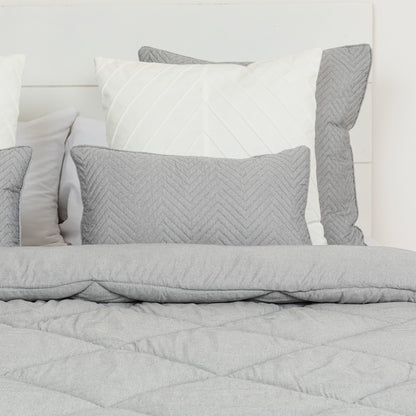 Edredom liso com efeito desgastado