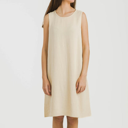 Vestido curto com alças, em musselina de algodão lisa.