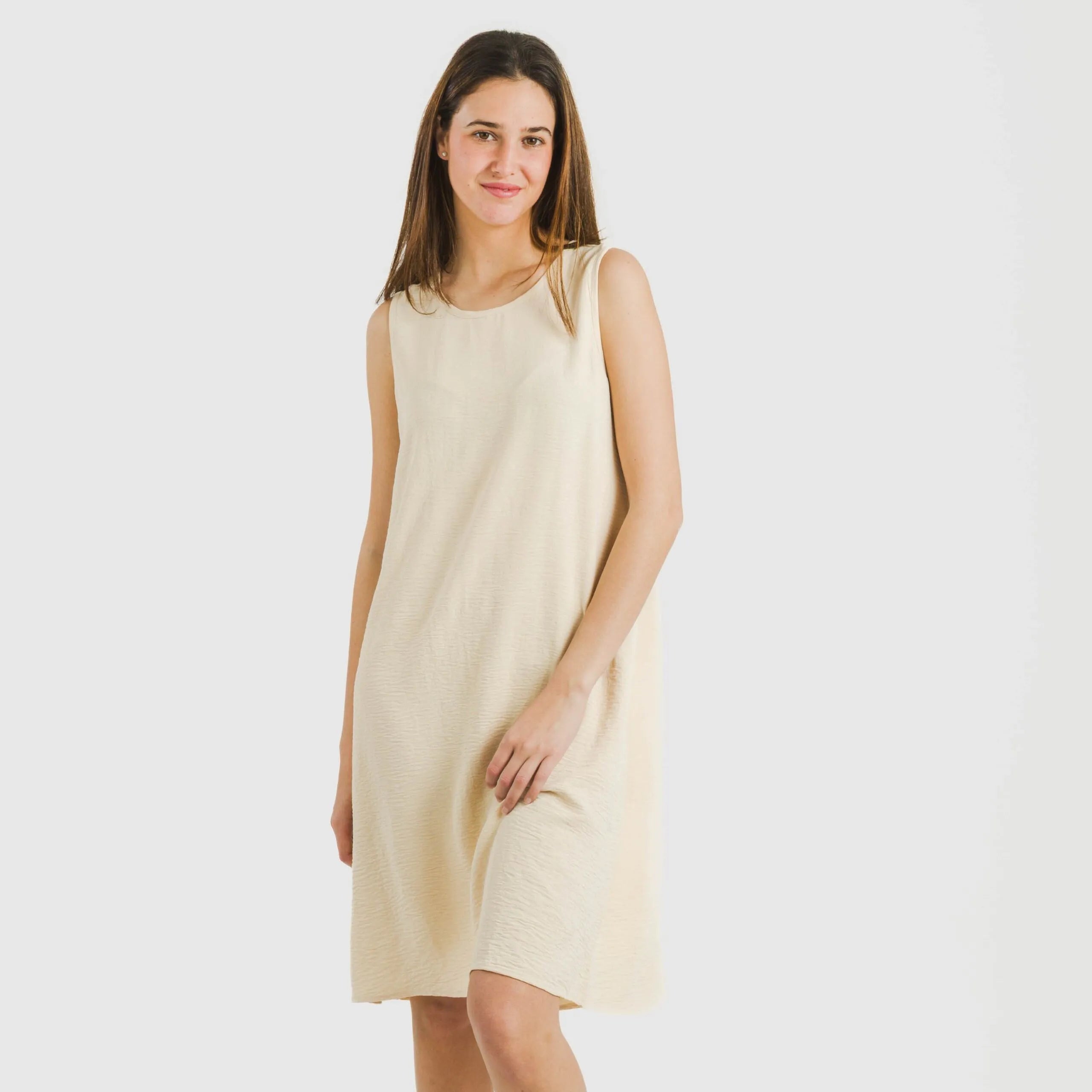 Vestido curto com alças, em musselina de algodão lisa.