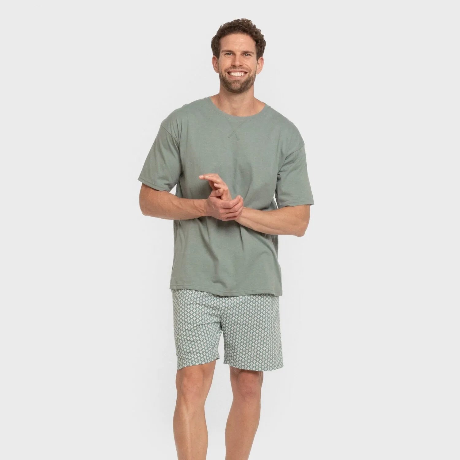 Pijama curto masculino de algodão na cor verde-azulado, estilo ousado.
